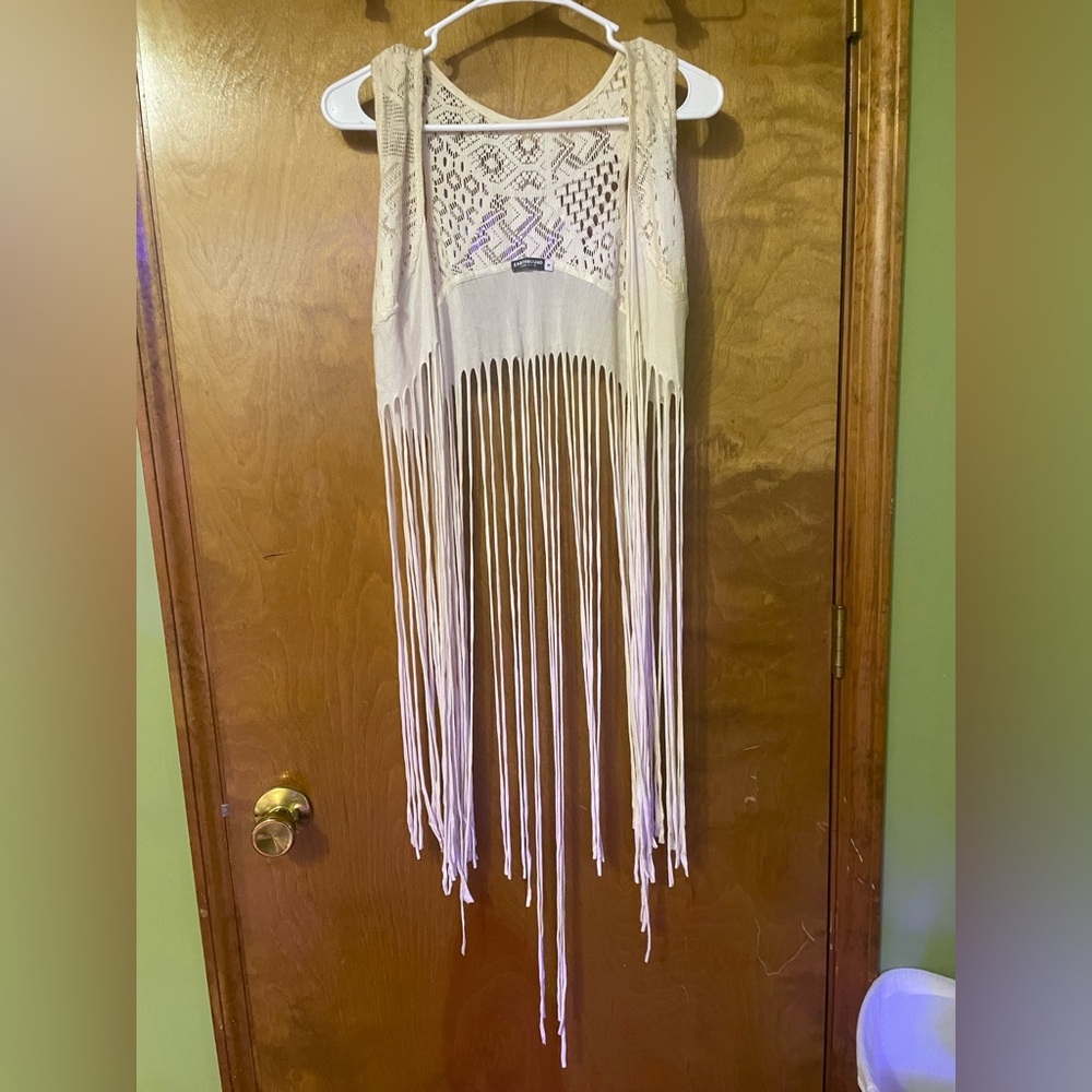 earthbound lace and fringe over shirt.